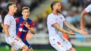 Barcelona Claims Top Spot in La Liga with a 1-0 Victory Over Sevilla Thanks to Sergio Ramos' Unfortunate Own Goal