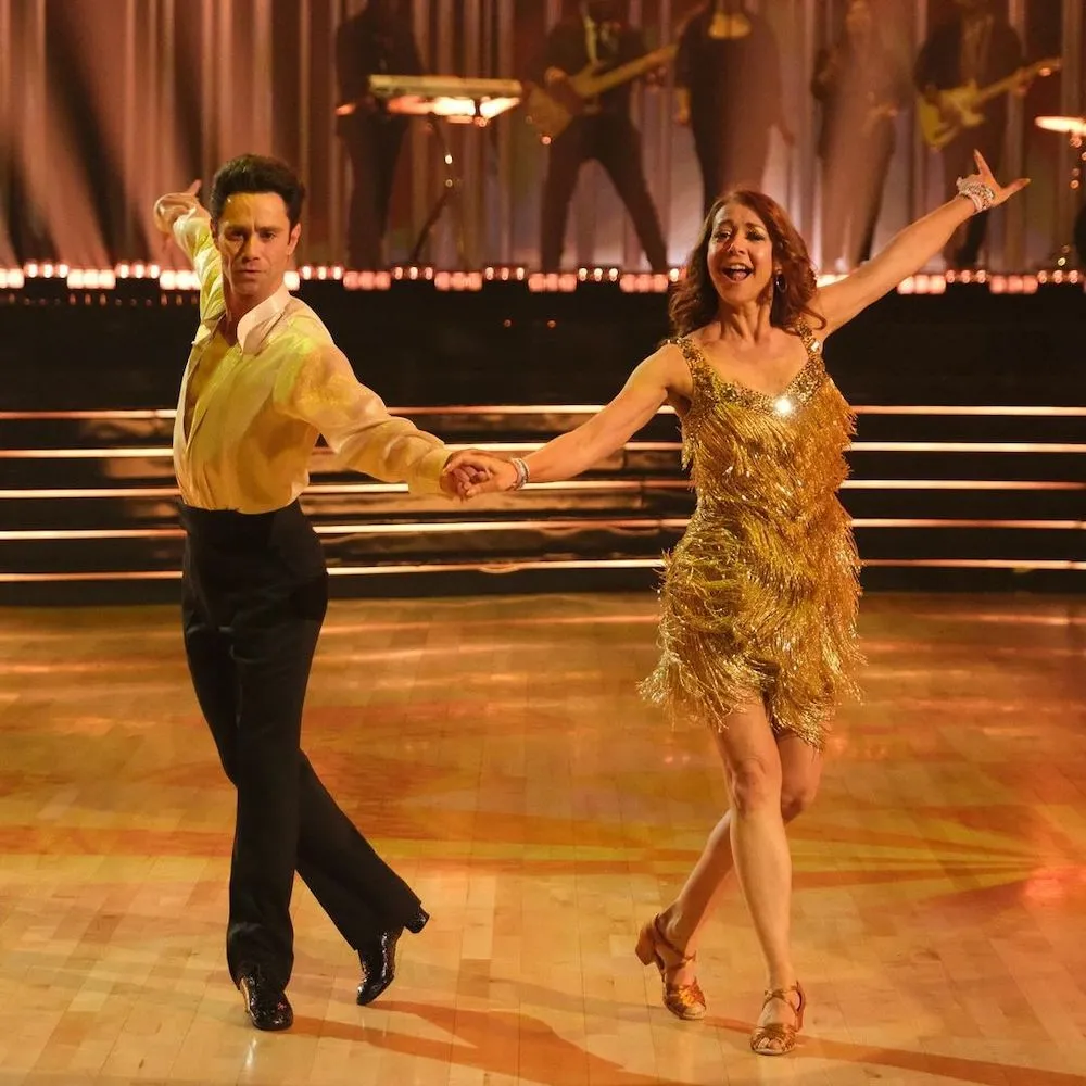 Dancing With the Stars- Alyson Hannigan and Sasha Farber channeled Taylor Swift's 'Fearless Era' for their Cha Cha performance. - The judges praised Alyson for her improvement and fearless approach, despite some feedback about pacing.